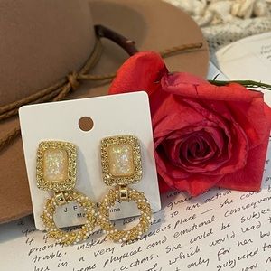 Beautiful gold women’s earrings